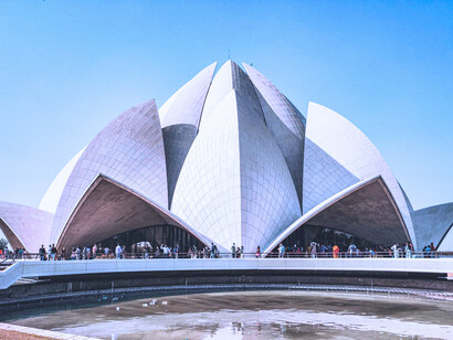 Located in New Delhi, India, the Lotus Temple is a place of worship well-known for its unique white lotus flower design