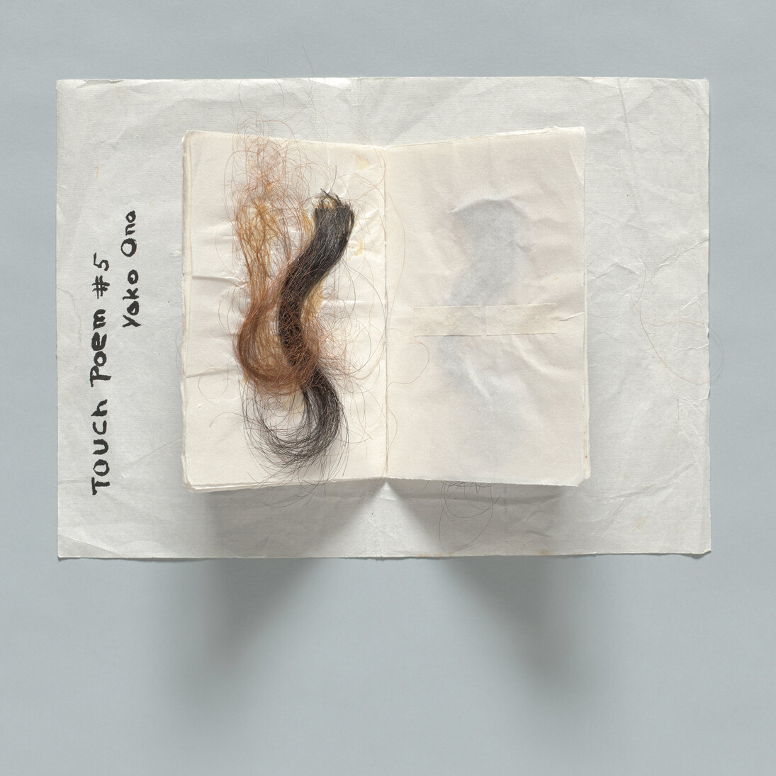 Yoko Ono (Japanese, born 1933), Touch Poem #5. c. 1960. Hair, ink on paper, 9 7/8 × 13 7/16″ (25 x 34.1 cm). Private collection. © Yoko Ono 2014