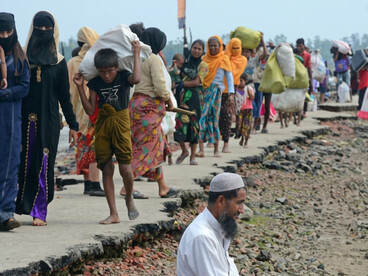 Rohingya refugees entering Bangladesh after crossing the border from Myanmar