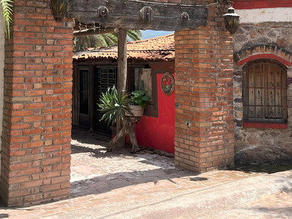 The old brick entrance archway
