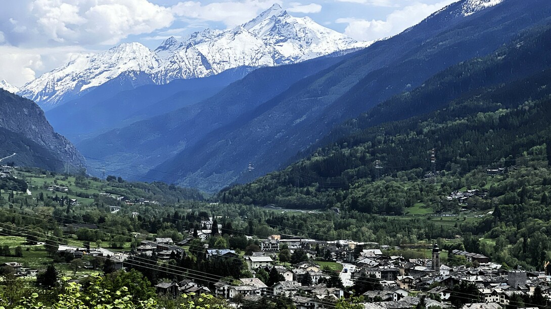 Mont Blanc, towering above the Val d’Aosta region, provides a majestic backdrop to the ancient village of Morgex © Donatella Polizzi