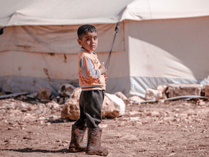 In the midst of chaos in war-torn Syria, the innocence of childhood serves as a poignant reminder of the human cost of conflict