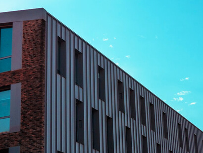 With sleek lines and reflective surfaces, these metal panels add a contemporary touch to the structure, demonstrating the versatility of metal in creating visually captivating designs