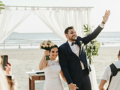 Tropical blooms, ocean breezes, and pure joy set the scene for this dream wedding moment