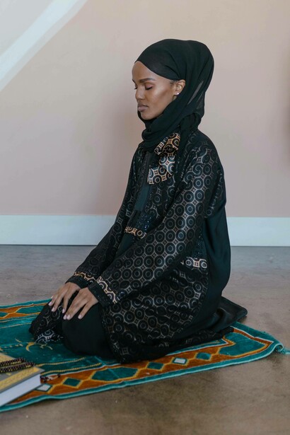 Muslim woman in prayer