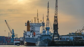 A shipping boat near dock before sunset
