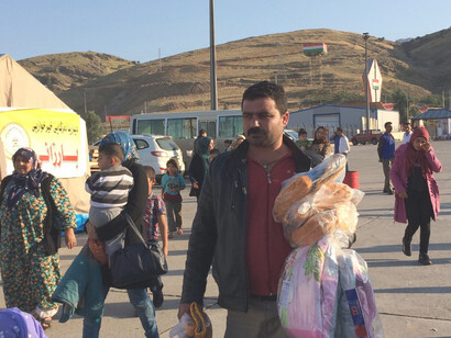 Hundreds of Syrian families have been arriving daily at the Ibrahim Khalil checkpoint on the Turkey–Iraq border, escaping violence in Kobane and surrounding areas of southern Syria, while more than 10,000 refugees have sought refuge in the Kurdistan Region of Iraq since mid-September