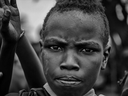 With a calm and composed look, this Kisii child’s eyes speak volumes about the cultural pride and traditional values held by the tribe