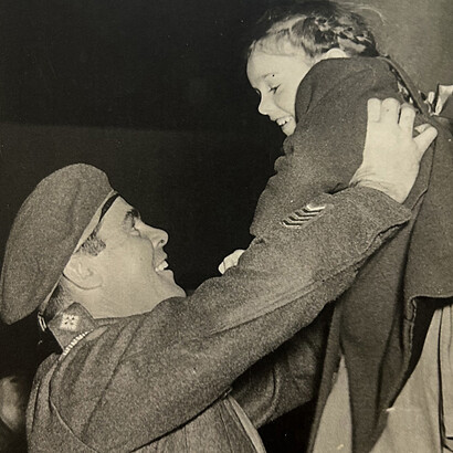 On his return to Winnipeg in 1945, Leonard Corrigan greets his daughter Shelagh. Courtesy of the Canadian War Museum