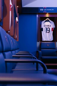 Inside a professional football locker room in Paris, Île-de-France, France