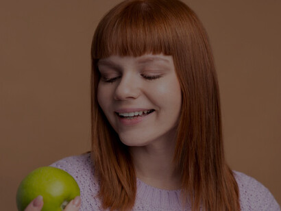 A woman battling an eating disorder, determined to embrace healthier eating habits