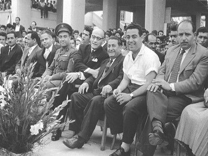 Massoud Bouton (right) at a sports event with Beirut municipal officials in 1959