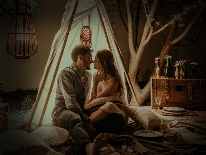 A man and a woman enjoying a night in their backyard. Giving up doing what you like and keeping doing what you need or what is necessary, is a way of neutralizing contradictions