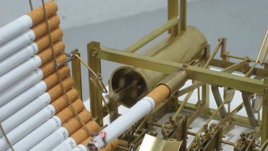 Kristoffer Myskja, Smoking machine 2007 cigarettes, various metals, filament, motor, 23 x 15 x 20 cm
