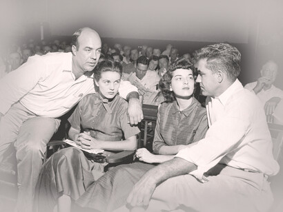 Sept. 23, 1955, the accused, J.W. Milam, left, his wife, second from left, Roy Bryant, far right, and his wife, Carolyn Bryant, sit together in a courtroom in Sumner, Mississippi, USA