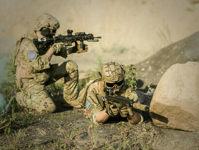 War and peace are interdependent cycles that transform energy and matter in social systems