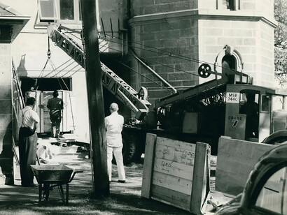 Photograph depicting the installation of a Grubb Parsons Plate Measuring machine at Sydney Observatory. Courtesy of Powerhouse