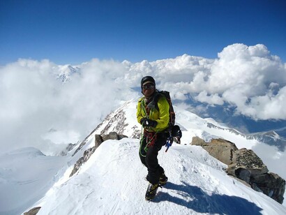 Mountaineers climbing to the peak of a summit in Nepal's Himalayas