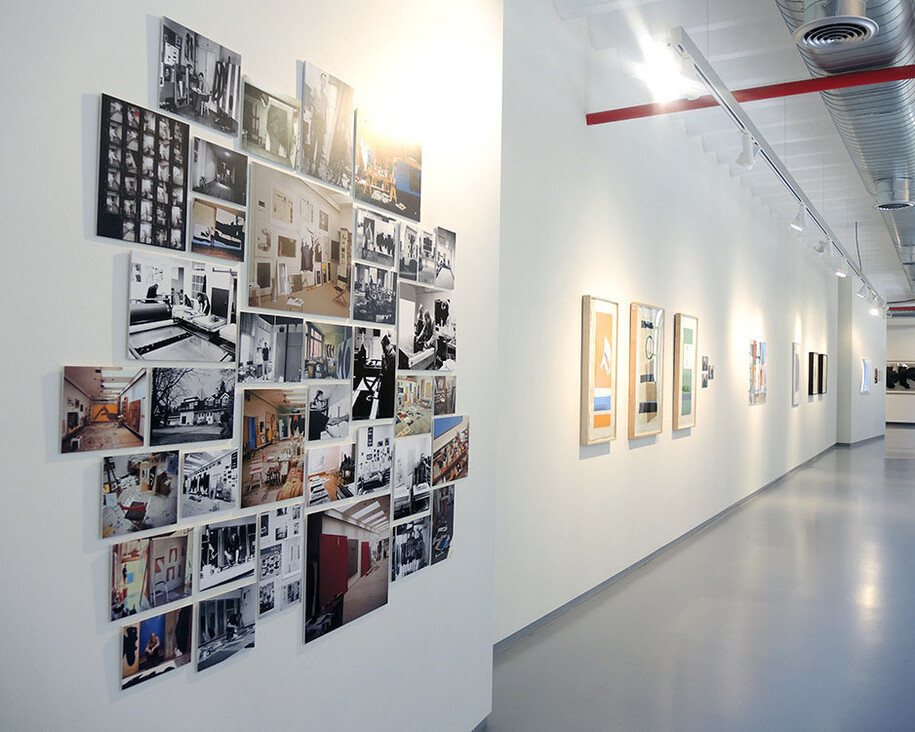 Installation view with of photographs of Motherwell's various studios and lithographs from the 1970s. Courtesy of the Dedalus Foundation Archives. 