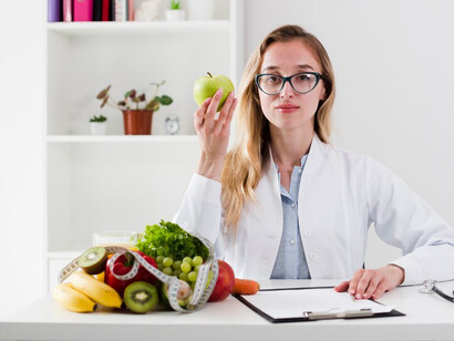 Scientific representation of a female researcher analyzing DNA strands and their connection to diet and nutrition