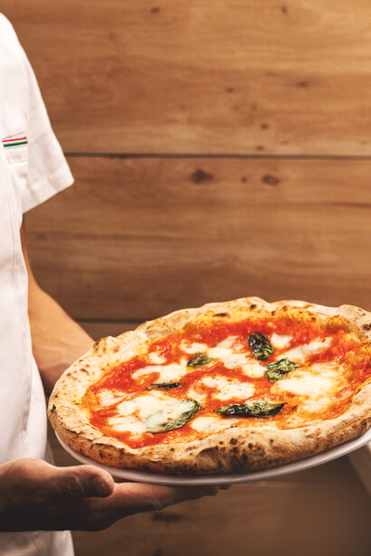 Pizza clásica Margarita. Los 'pizzaiolos' actuales prefieren los hornos con domo, de leña y cocinar sus creaciones a altas temperaturas