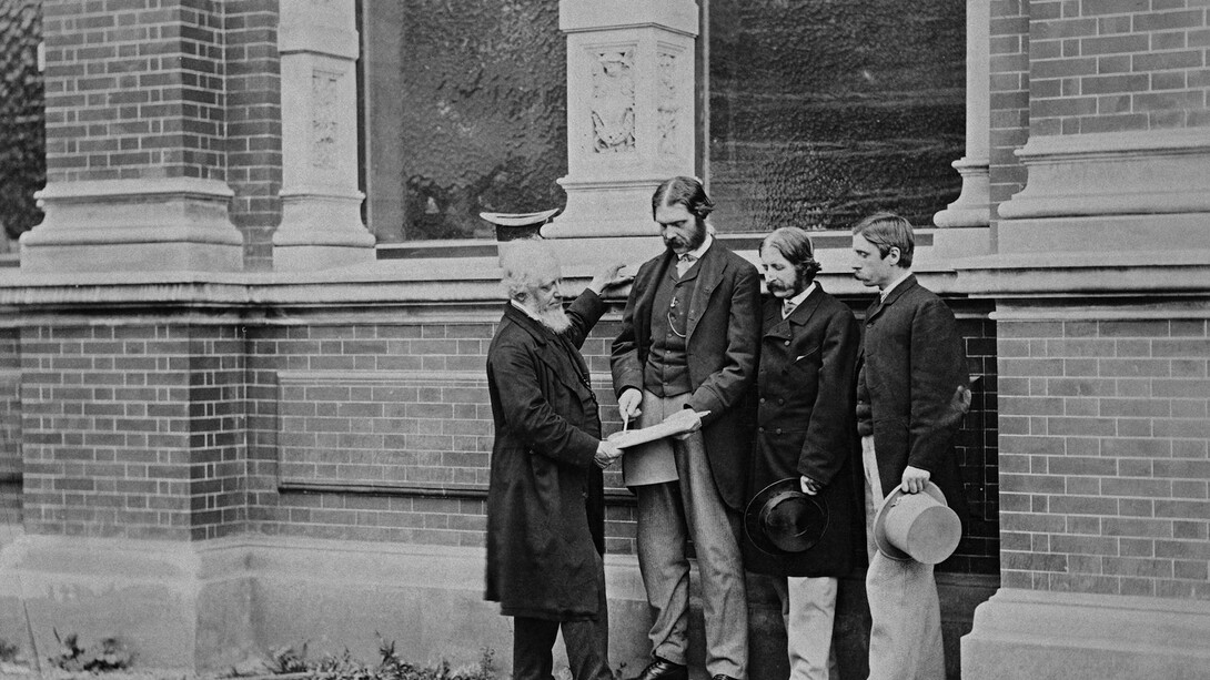 Henry Cole, Francis Fowke, Godfrey Sykes and John Liddell in front of the residences range, photograph possibly by Charles Thurston Thompson, about 1863. Museum no. E.1086-1989. © Victoria and Albert Museum, London
