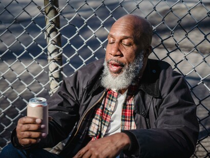 A man who is struggling with an alcohol addition 