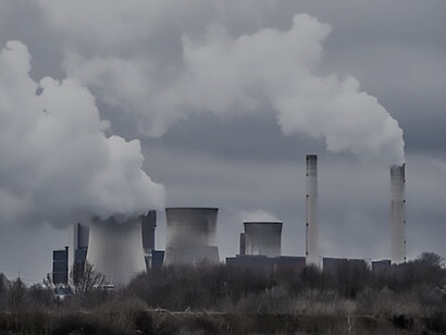 Wide angle shot of white smoke coming out of the nuclear plants