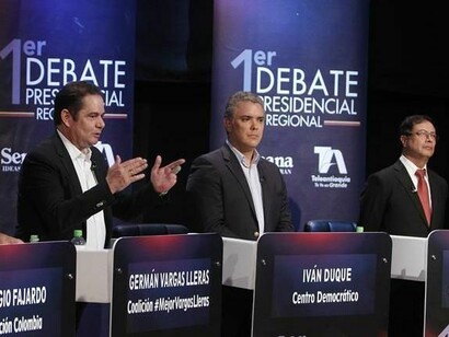 Vargas Lleras, Iván Duque y Gustavo Petro durante un reciente debate presidencial en Colombia