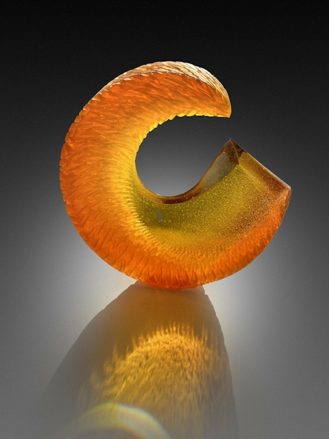 Alex Gabriel Bernstein, Amber sunrise, 2023, cast and carved glass, 18x18x3 inches