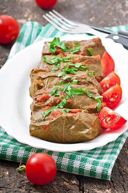 Yaprak sarma, a traditional Turkish dish of grape leaves stuffed with a savory rice and spice mixture, showcases the rich flavors and cultural heritage of Turkish cuisine