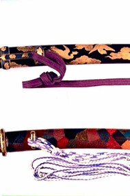 Top: Hardwood sacred beast motif in gold color, Edo period; bottom: multi-painted wooden sheath for a small sword © Japanese Sword Museum