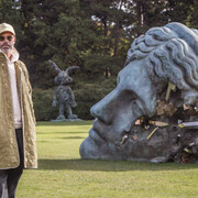 Daniel Arsham with Unearthed Bronze Eroded Melpomene, 2021. Installation view at Yorkshire Sculpture Park. Courtesy Perrotin Gallery and Arsham Studio. Photo by Anthony Devlin. Getty Images for Daniel Arsham