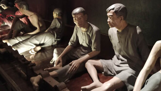 The reenactment display of prisoners at the Hoa Lo Prison, photo by Daniel Gauss