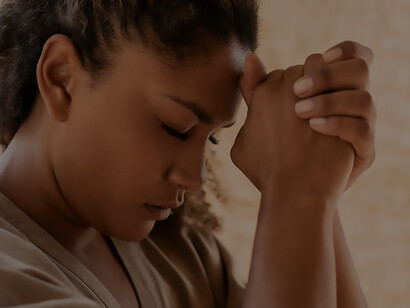 Young woman embodying hope, faith, and strength through prayer, symbolizing growth and belief