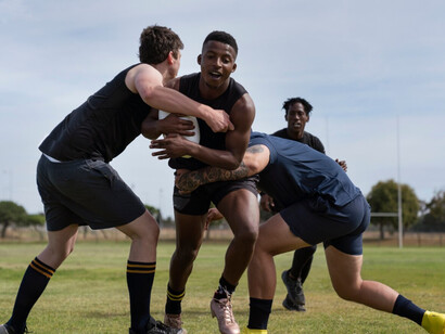 A group of rugby players train with instinct and drive, key components that AI lacks 