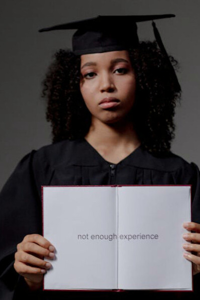 For many young graduates in, the excitement of earning a degree is quickly replaced with the weight of joblessness, as seen in this young woman’s resigned look