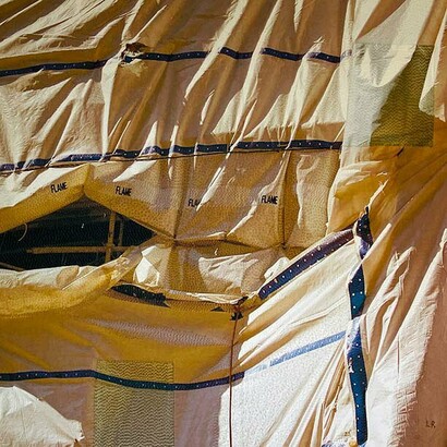 Luanne Rimel, Firewall,
photograph printed on silk, hand-stitched with cotton embroidery thread,
29" x 29",
2024. Courtesy of the artist and Duane Reed Gallery