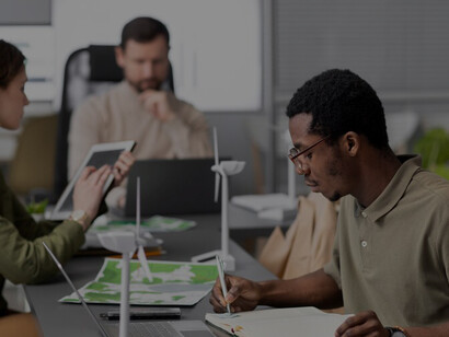 Embark on a journey of discovery as researchers brainstorm alternative energy sources, convening around a table in a dynamic meeting setting, fueling the quest for sustainable solutions