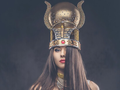 Portrait of haughty egyptian queen in an ancient pharaoh costume