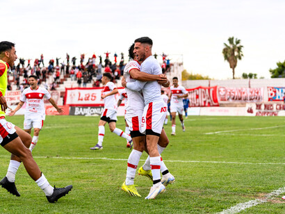 A group of players rejoicing, symbolizing the happiness of winning a match