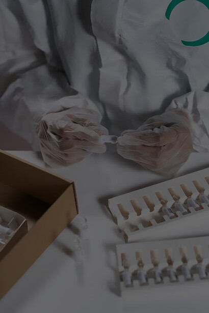 In the preparation phase of healthcare, a diligent healthcare worker opens vital vaccine packages, ready to contribute to the critical vaccine distribution mission