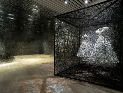 Shiota Chiharu, Reflection of Space and Time (detail), 2018, White dress, mirror, metal frame, Alcantara black thread, 280 × 300 × 400 cm, Commissioned by Alcantara S.p.A, Installation view: Shiota Chiharu: The Soul Trembles, Mori Art Museum, Tokyo, 2019 © Sunhi Mang, Photo courtesy: Mori Art Museum, Tokyo