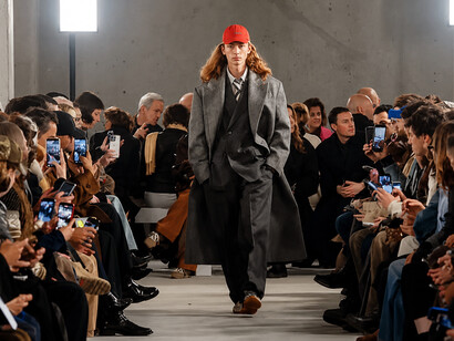 Models showcase the Ami Paris Women’s and Men’s Fall/Winter 2026 collection at Paris Fashion Week