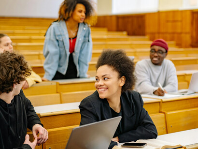 Students are inside a university classroo