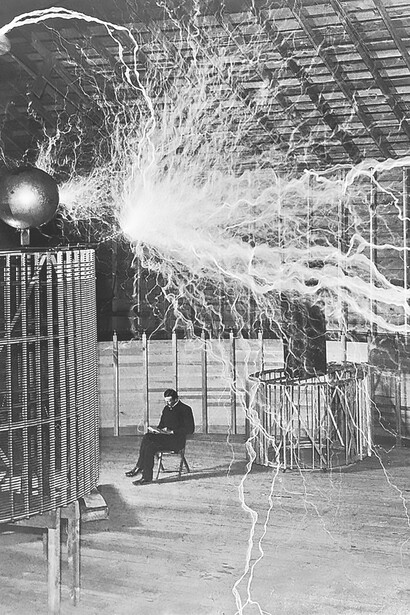 Famous photograph of Serbian-American inventor Nikola Tesla in his laboratory in Colorado Springs around 1899