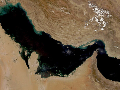A true-color image captured on December 2, 2020, by the Moderate Resolution Imaging Spectroradiometer (MODIS) aboard NASA’s Terra satellite shows the Strait of Hormuz, a vital maritime corridor for global oil transportation and energy trade