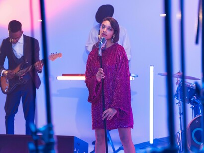 Woman showcasing her singing talent