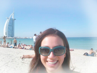 The author on her birthday, with the Burj Al Arab in the background in Dubai, United Arab Emirates
