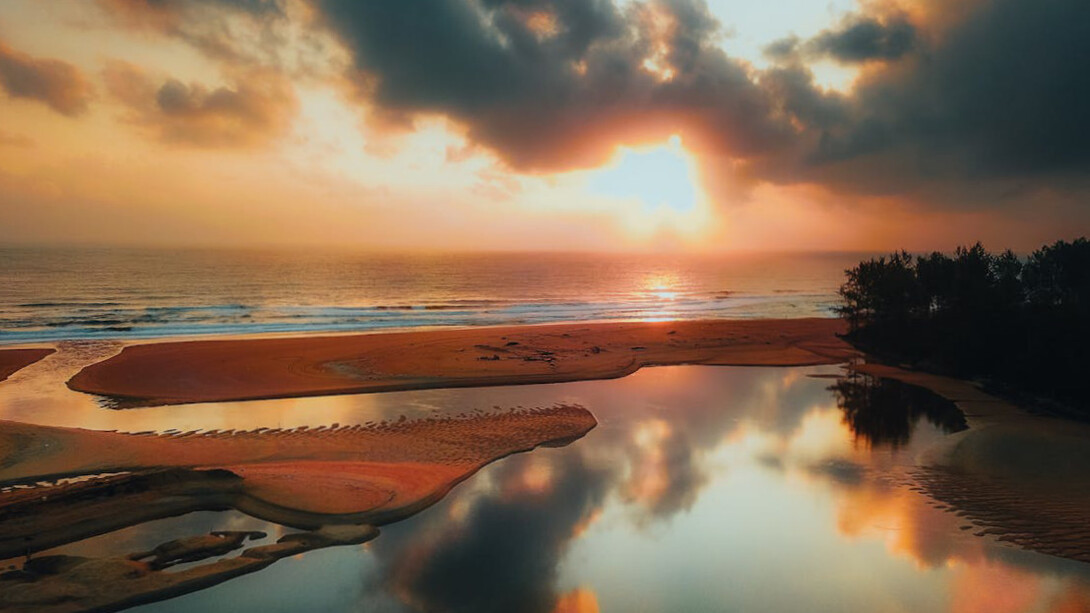 In the mirror of the ocean, the sky reflects the uncertainty and confusion of life's unexpected turns, reminding us that clarity often comes from the depths of introspection